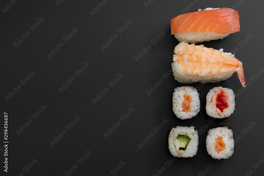 Japanese seafood sushi set on black background isolated, copy space Japanese seafood sushi set on black background isolated, copy space