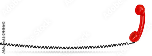 red colored old fashioned retro phone reciever with black telephone wire isolated white background with copy space. business problem solution communication support service concept
