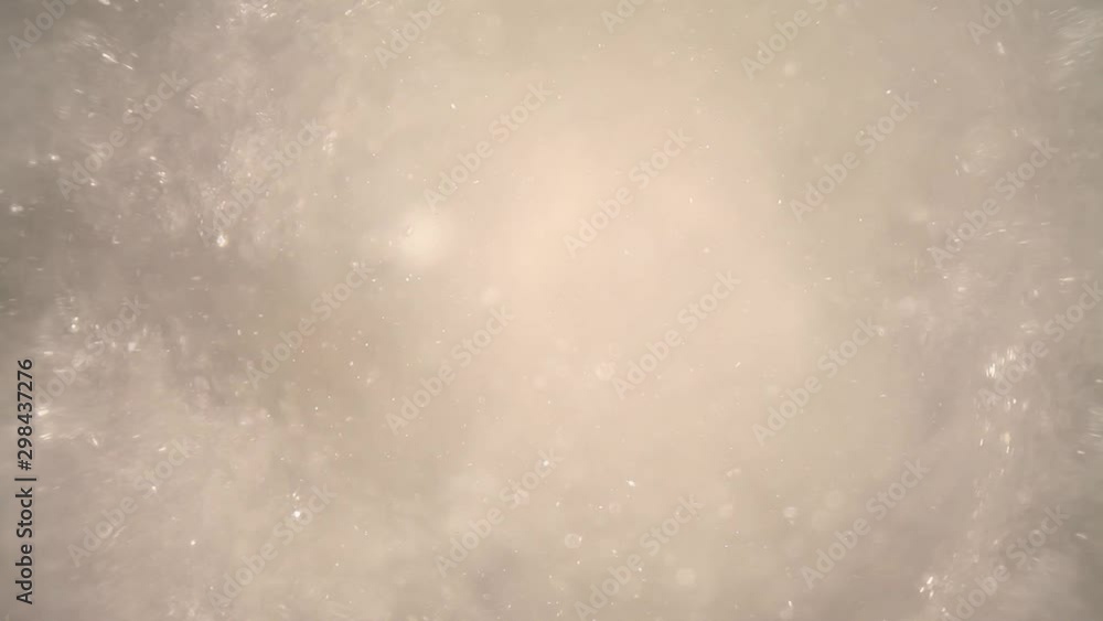 submerged in a blender filled with crushed ice cubes & water, pulling away from ice as particles in water float around - using a wide angle probe lens, getting unique perspectives. submerged in a blender filled with crushed ice cubes & water, pulling away from ice as particles in water float around - using a wide angle probe lens, getting unique perspectives.