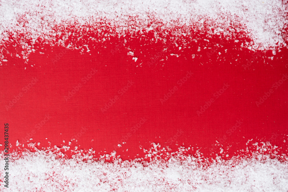 Red christmas background with snow borders. Winter, Christmas mockup. Copy space.
