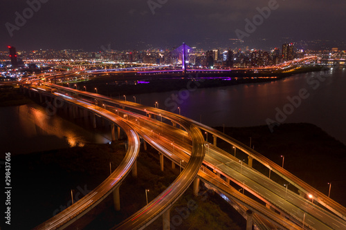 Taiwan, New Taipei City, the beautiful twists and turns of the river, reflecting the sky, bridges, city beautiful scenery.