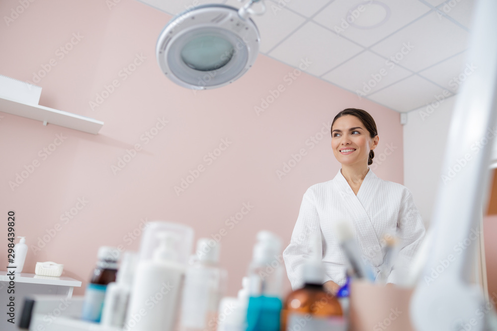 Cheerful young woman resting at spa salon Cheerful young woman resting at spa salon