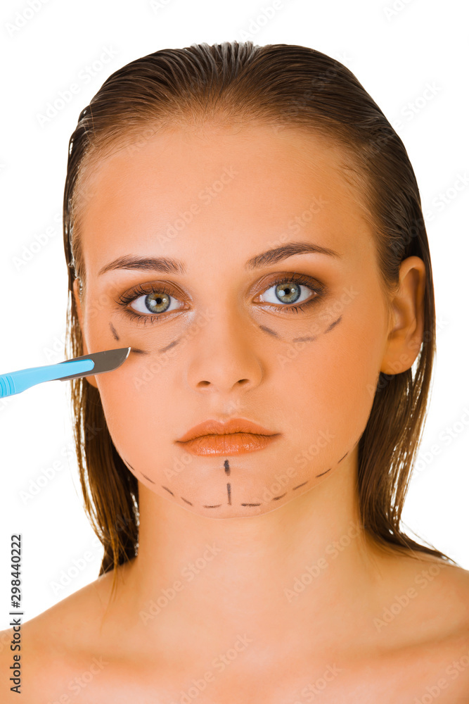 Woman face with surgical marks for operation. Lifting skin and removing wrinkle. Woman face with surgical marks for operation. Lifting skin and removing wrinkle.