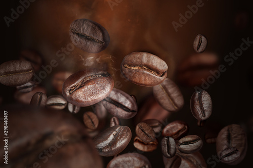Roasted coffee beans on grey background, closeup