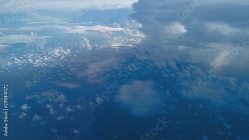 Wallpaper Mural View out of  the window from airplane above beautiful multilayer white cumulus  clouds formation while flying north over Gulf of Mexico. Torontodigital.ca