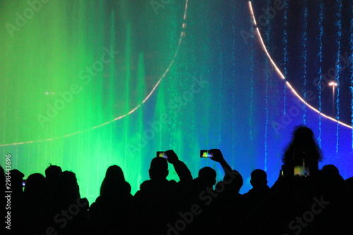 Spectators who follow the work of the musical fountain