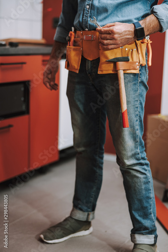 Small spanner in hand of construction worker stock photo © Yakobchuk Olena