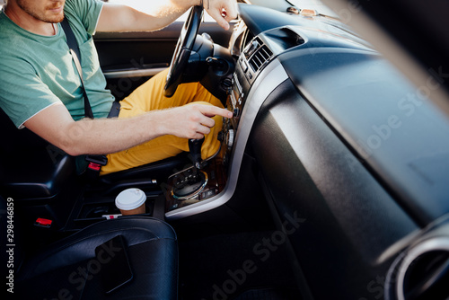 Guy listening to music in car stock photo