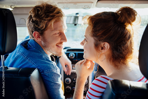 Man and woman cudling in car stock photo