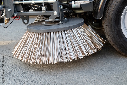 Sweeping equipment for routine year-round municipal street and highway sweeping.Big round broom of street sweeper with wide sweeping path and maintains contact with pavement on its own. © Matrix Reloaded