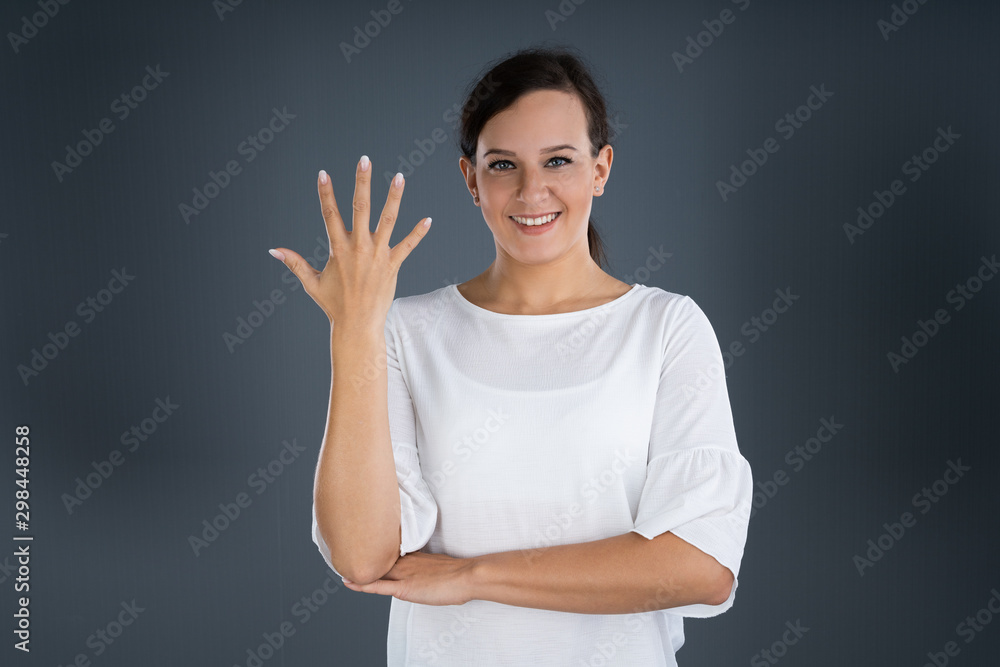 Woman Using Sign Language To Communicate Showing Word Tree Woman Using Sign Language To Communicate Showing Word Tree