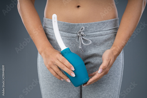 Woman Holding Vaginal Wash photo