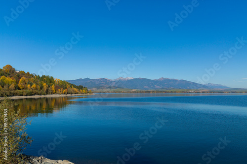 Beautiful nature autumn landscape with colorful forest and lake.Country Slovakia