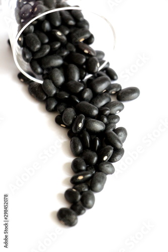 Black beans on white background.  Different forms of dry beans.  Black Bean Grains.