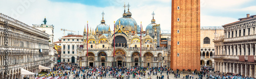 San Marco Square, Venice, Italy. Panoramic view of St Mark's Basilica. It is top landmark of Venice. Panorama of famous tourist place in Venice city and Europe. Renaissance architecture of Venice.