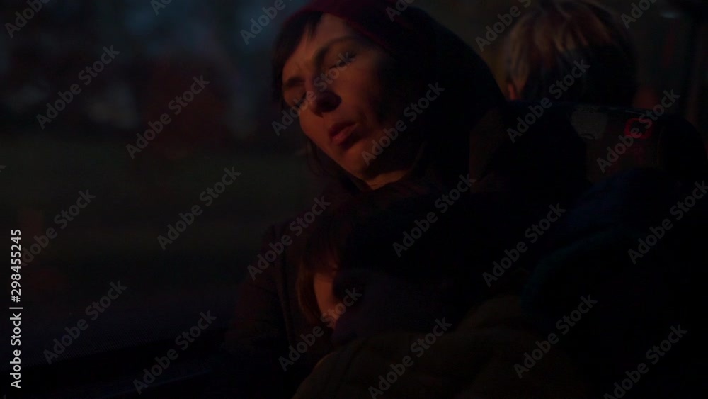 The girls face is illuminated very early in the morning. The girls face is illuminated very early in the morning.