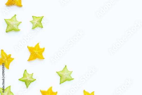 Ripe star fruit on white background.
