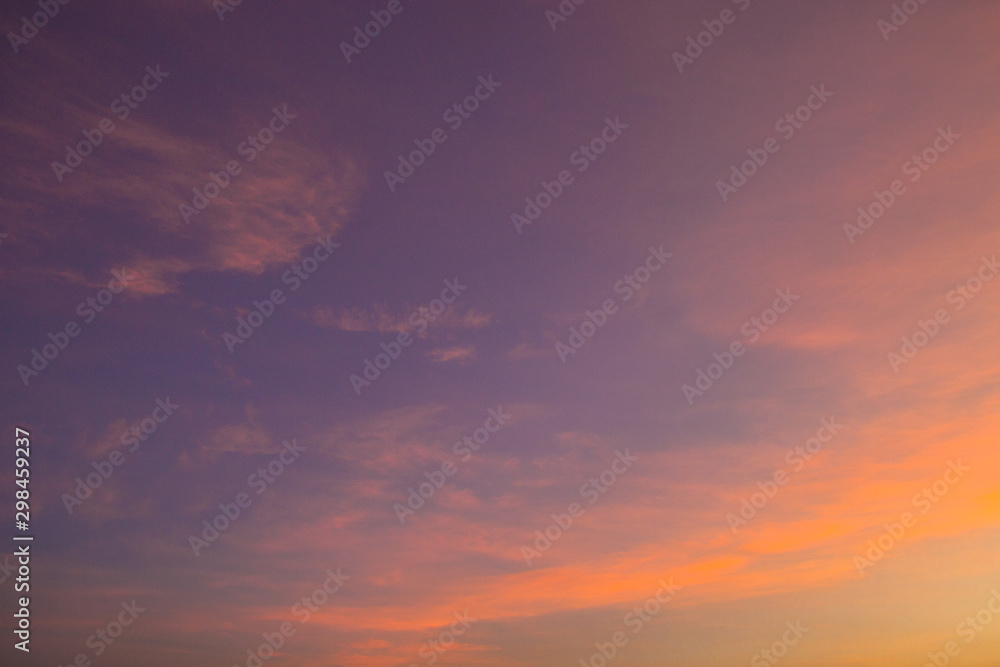 Sunset sky in the evening with colorful sunlight on clouds