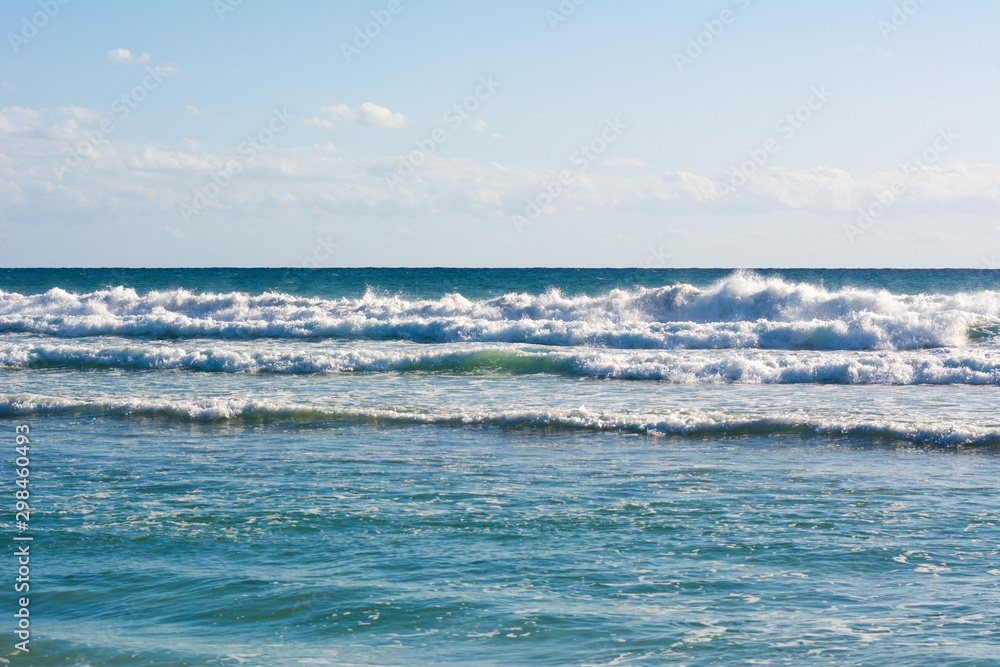 View of sea and waves in windy day. Son Bou beach, one of the most impressive sites of Menorca island. Spain