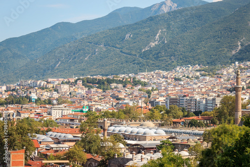 Bursa city view landscape. Grand mosque and historical inn. Uludag mountain landscape. Bursa is fourth biggest city in Turkey. © hasbisahin