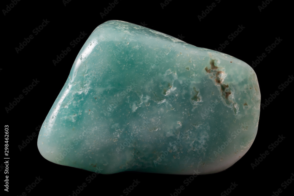 Rock of green tourmaline mineral from Brazil isolated on a pure black background. Also known as verdelite or brazilian emerald. Rock of green tourmaline mineral from Brazil isolated on a pure black background. Also known as verdelite or brazilian emerald.