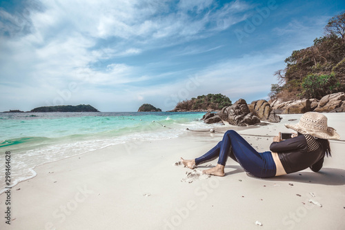 young woman on the beach in Lipe island, Thailand