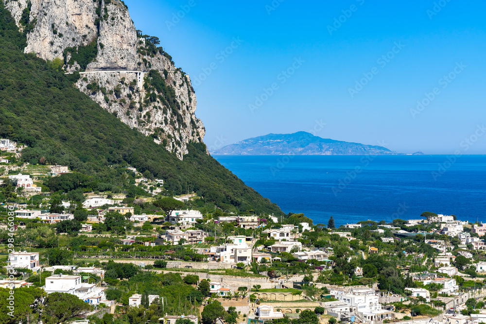 The beautiful landscape of the Isle of Capri with Ischia in the background, Campania, Italy