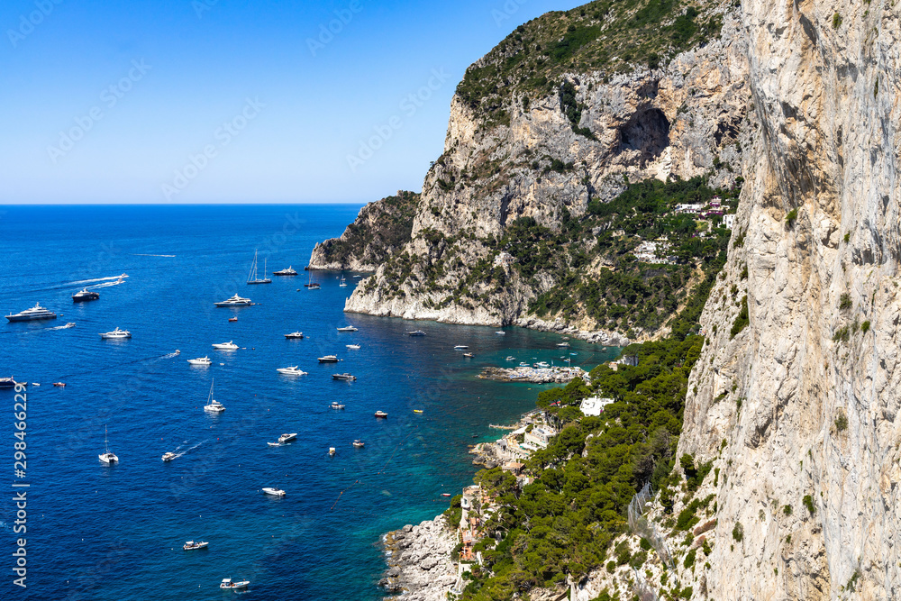 The dramatic coastline of Capri above Marina Piccola viewed from Gardens of Augustus, Campania, Italy