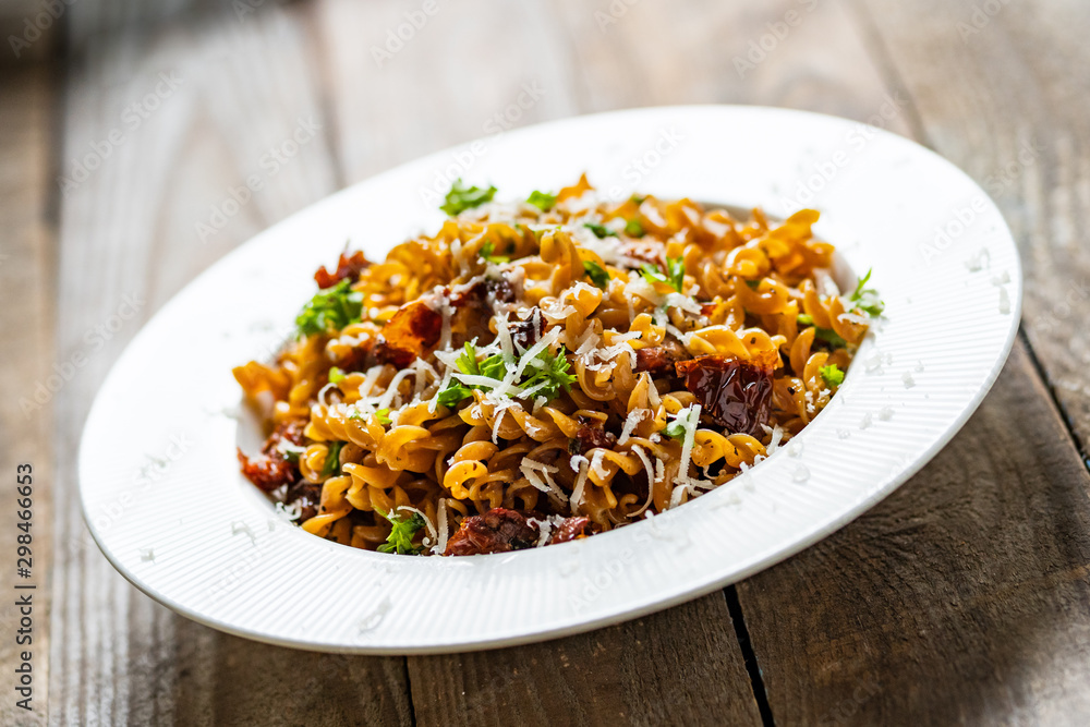 Pasta with sauce and sun-dried tomatoes Pasta with sauce and sun-dried tomatoes