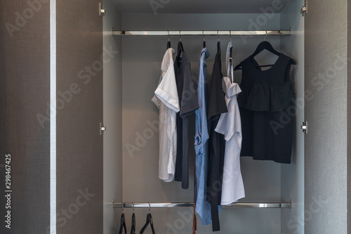 modern wardrobe with set of clothes © 290712