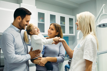 Family in dentist office