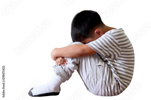 Asian boy bend down the head isolated on white background. Sad child and crying with sadness or problems.