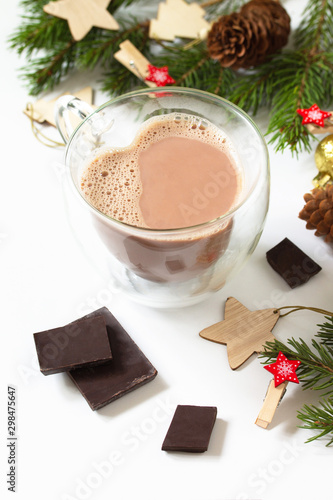 Cocoa drink with chocolate with a Christmas composition. Isolate on white background.