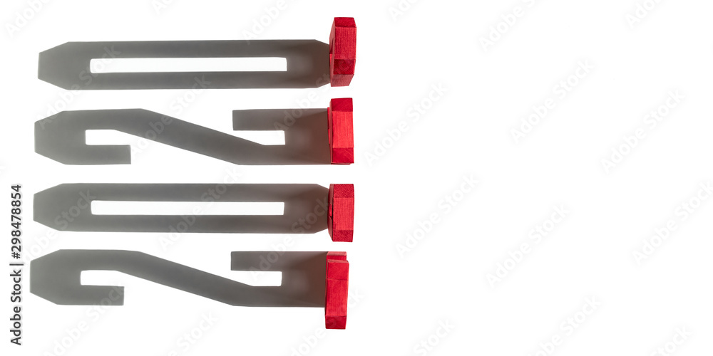 Long shadows from red geometric figures on white background. Concept of Happy New Year 2020. Space for text, top view Long shadows from red geometric figures on white background. Concept of Happy New Year 2020. Space for text, top view