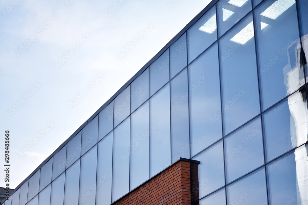 Modern office building detail, glass surface Modern office building detail, glass surface