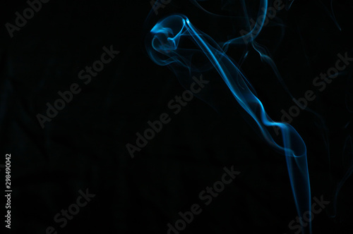 Smoke on a black background. Abstraction.