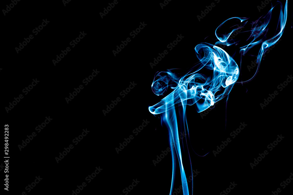 Smoke on a black background. Abstraction.