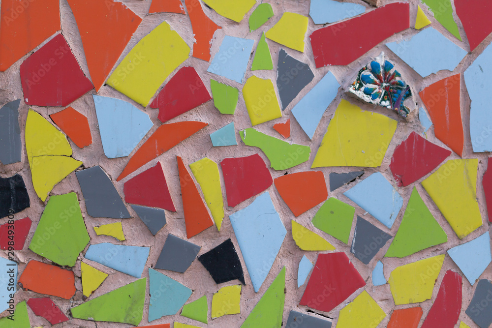 Multicolor ceramic mosaic wall. Close-up background.
