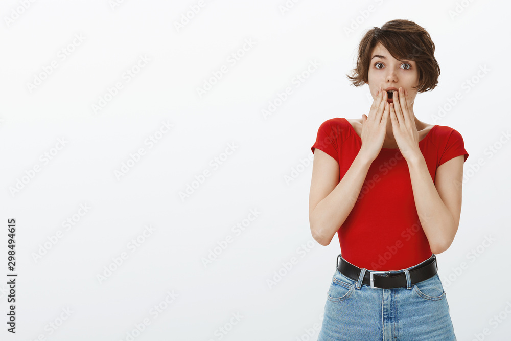 Oh gosh no way. Impressed speechless intrigued young brunette cute girl pixie haircut gasping shocked cover opened mouth palms wide eyes stare camera surprised find out huge secret white background Oh gosh no way. Impressed speechless intrigued young brunette cute girl pixie haircut gasping shocked cover opened mouth palms wide eyes stare camera surprised find out huge secret white background
