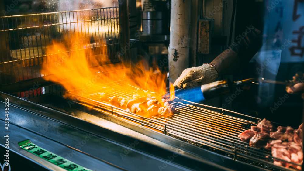 Employees are grilling meat to be sold, Taipei, Taiwan - 11 jun 2562. Employees are grilling meat to be sold, Taipei, Taiwan - 11 jun 2562.