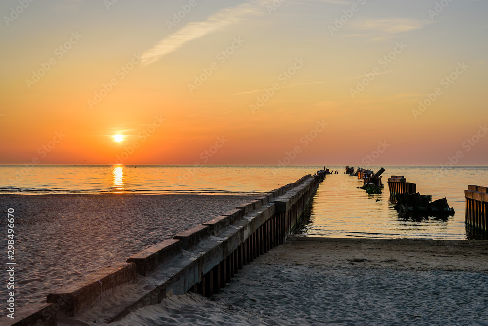 Beautiful sunset on the sea. Baltic sea at sunset, Narva-Joesuu, Estonia. Narva-Joesuu - seaside resort and popular holiday destination in Estonia