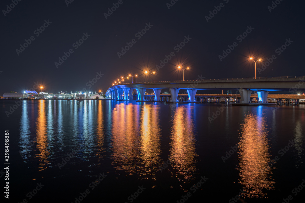 Night photo Miami Port Boulevard Bridge lit neon blue