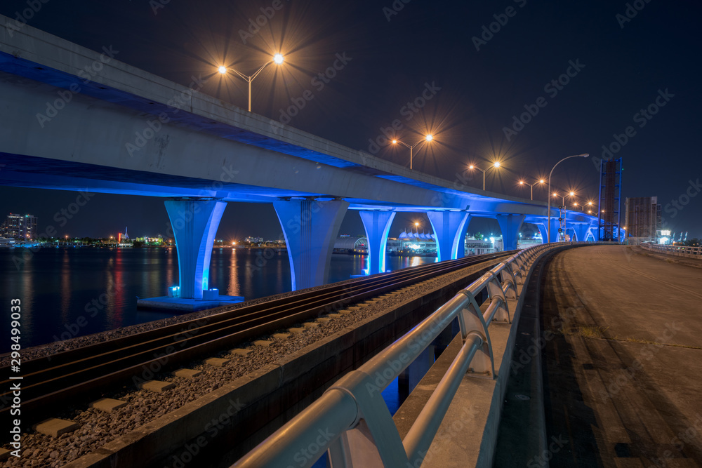 Night photo Downtown Miami port boulevard bridge lit neon electric blue