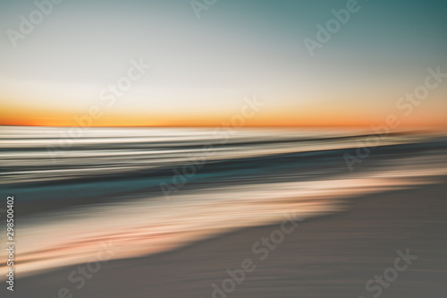 Abstract seascape. Beach at sunset. Motion blur, long exposure, soft colors