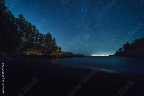 The magical and ethereal night sky with views of the milky way  nebulas  and stars within the Pacific North West s Bowen Island in stunning British Columbia Canada.