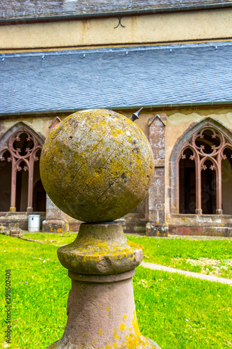 Old stone sundial at the Stiftskirche Kyllburg or Collegiate Church of Kyllburg in Bitburg, Pruem, Rhineland-Palatinate, Germany photo