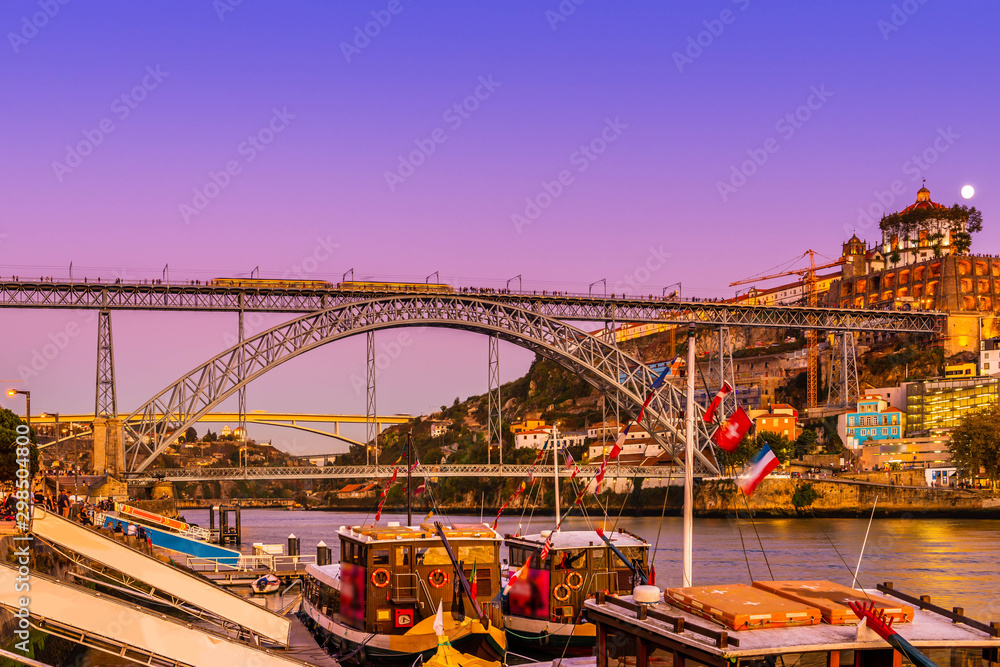 Panorama of the city of Porto on the river Douro at night in Portugal