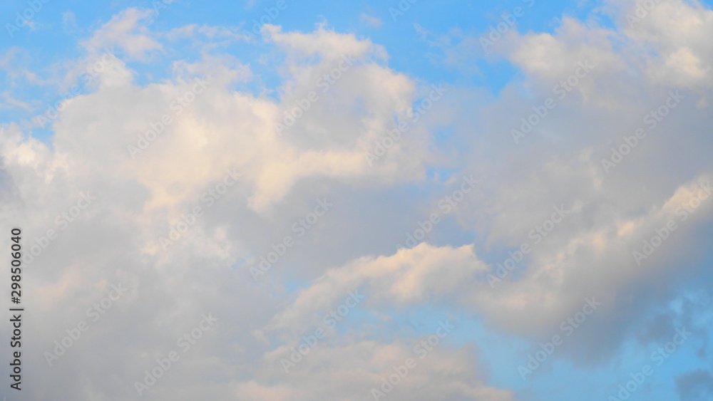Beautiful bright blue sky and white clouds for cute background, wallpaper and decoration. Cool banner on page, presentation and website. Blue sky and clouds theme, inspirational and new day concept