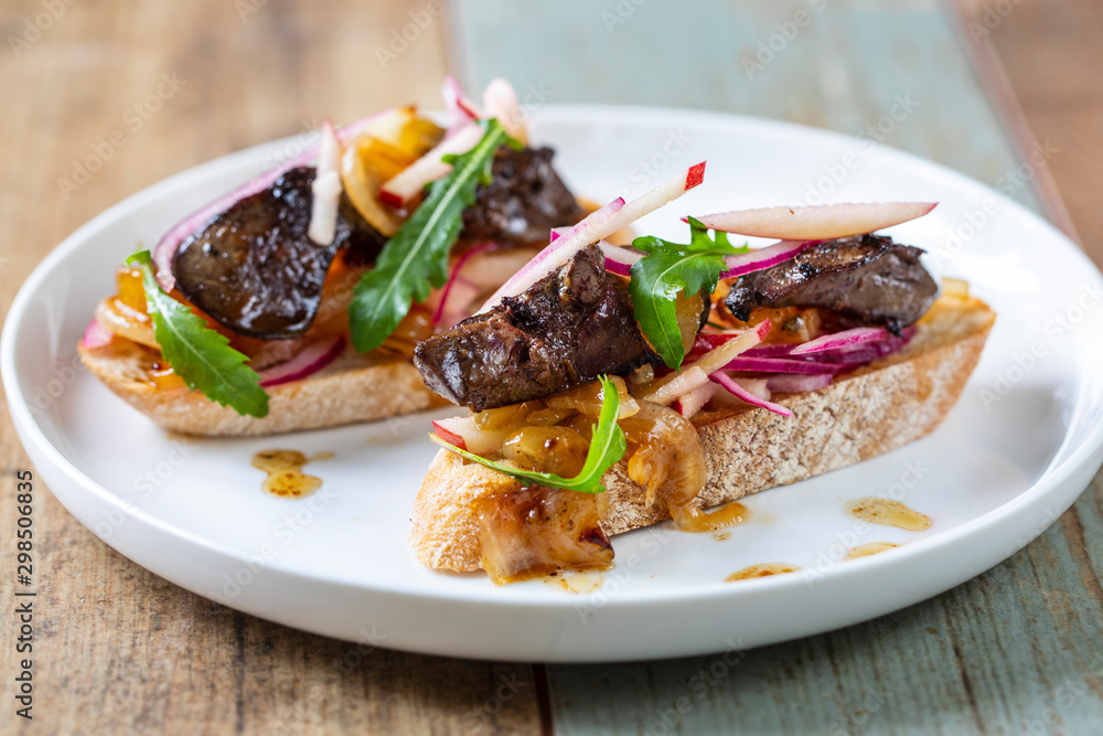 Chicken liver with apple, onion and mango chutney on toast Chicken liver with apple, onion and mango chutney on toast