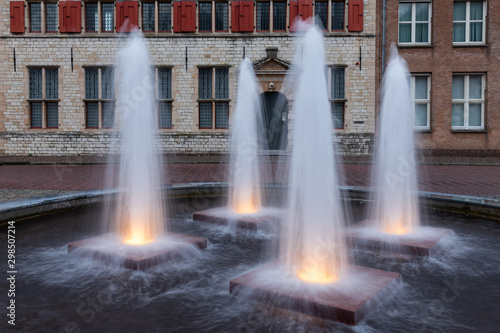 Four illuminated fountains in medieval city Middelburg  The Netherlands